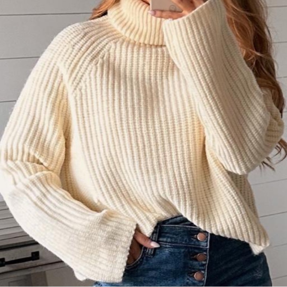 Cream knit slightly oversized turtleneck sweater